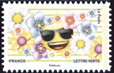  «emoji» les messagers de vos émotions <br>Emoji avec lunette de soleil et entouré de fleurs
